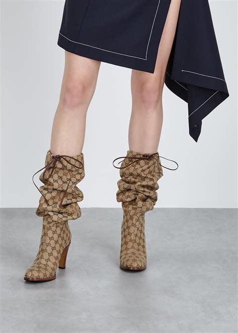 gucci monogram thigh high boots price|gucci high heel boots.